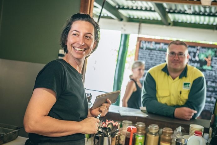 HQP employee with the owner of the Byfield store